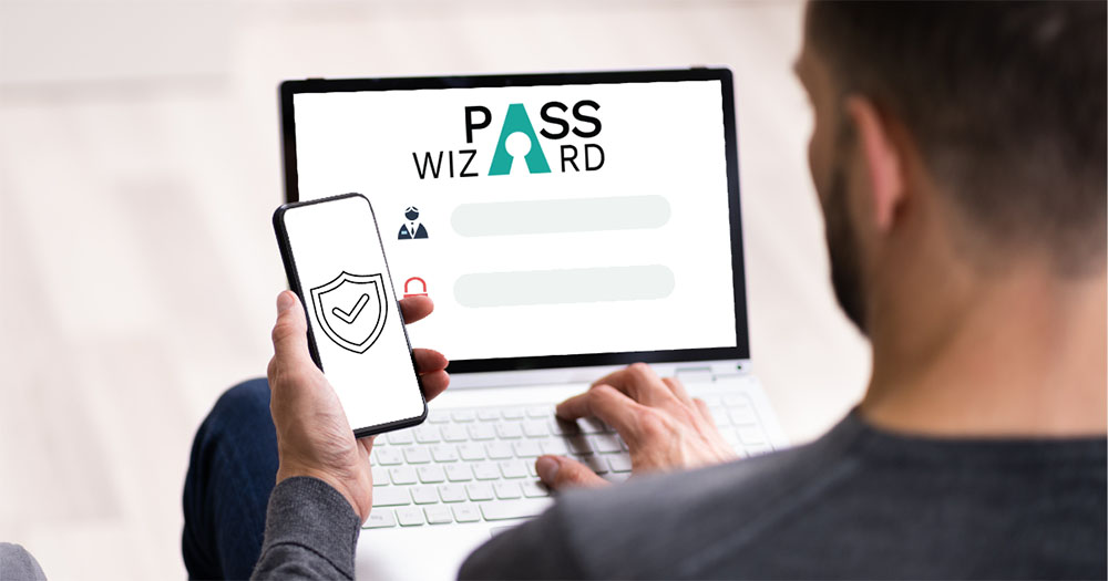 pass wizard login on laptop and authenticator app open on cell phone