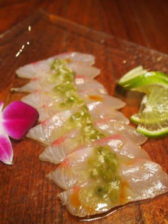 Seafood dishes and sushi, in w...